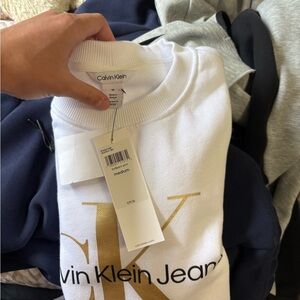 Calvin Klein White Sweatshirt with Gold Lettering